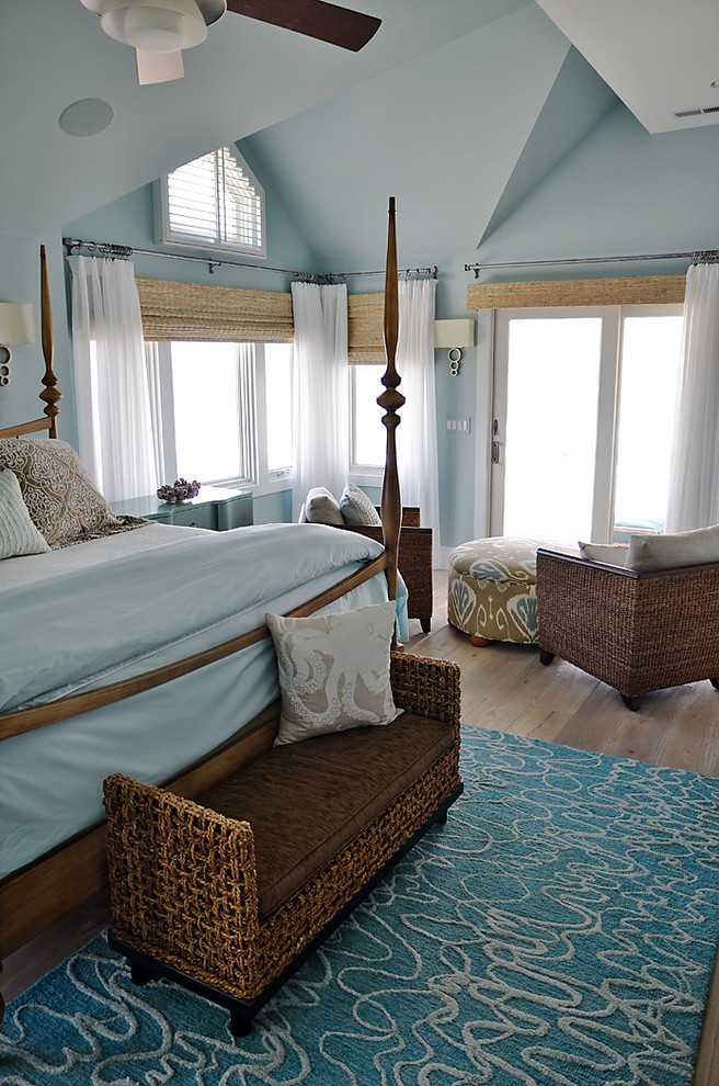 Inspiration for a mid-sized coastal master light wood floor bedroom remodel in Philadelphia with blue walls