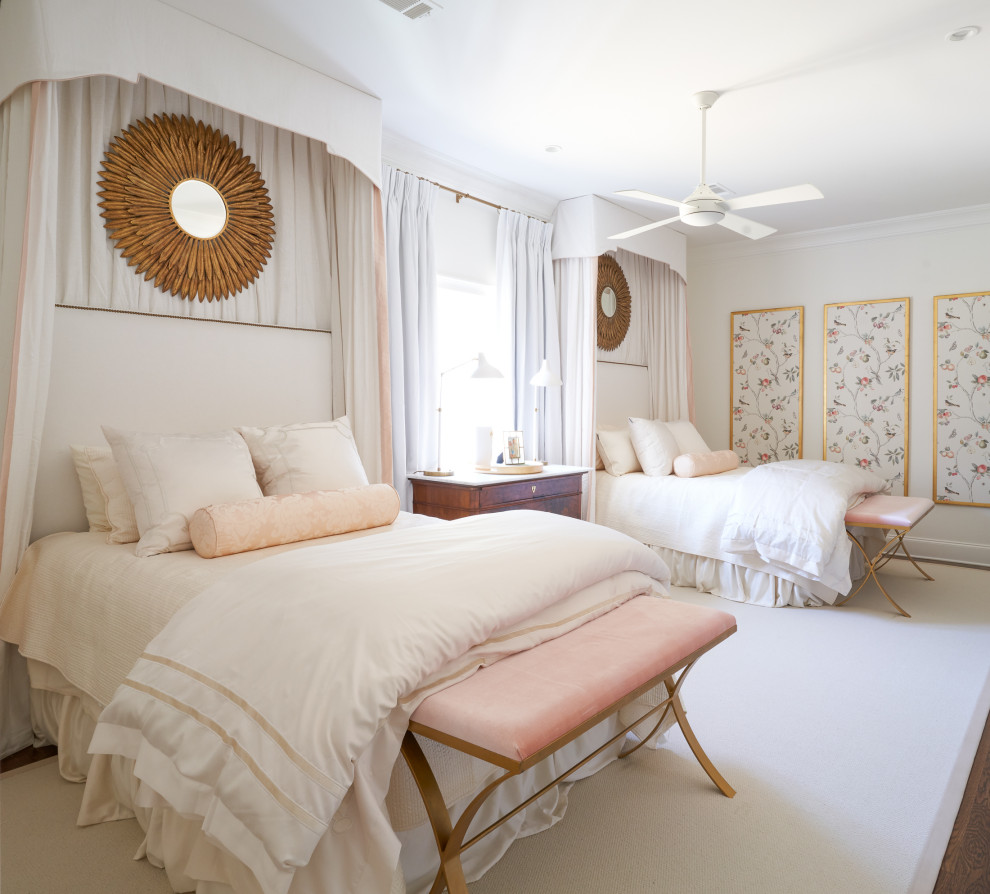 This is an example of a classic guest bedroom in New Orleans with white walls, medium hardwood flooring, no fireplace and brown floors.