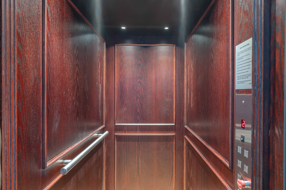 Entry hall - small wood wall entry hall idea in Philadelphia
