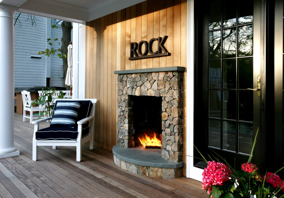 Design ideas for a country deck in Boston with a fire feature.