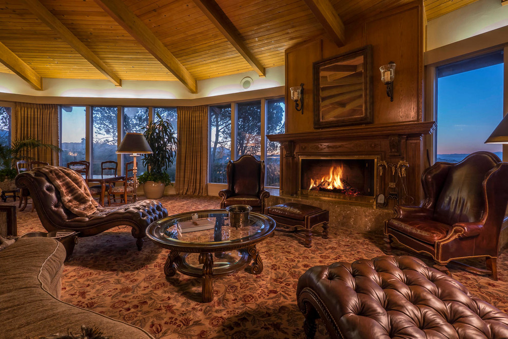 Photo of a large country formal open concept living room in Los Angeles with beige walls, carpet, a ribbon fireplace, a wood fireplace surround and brown floor.