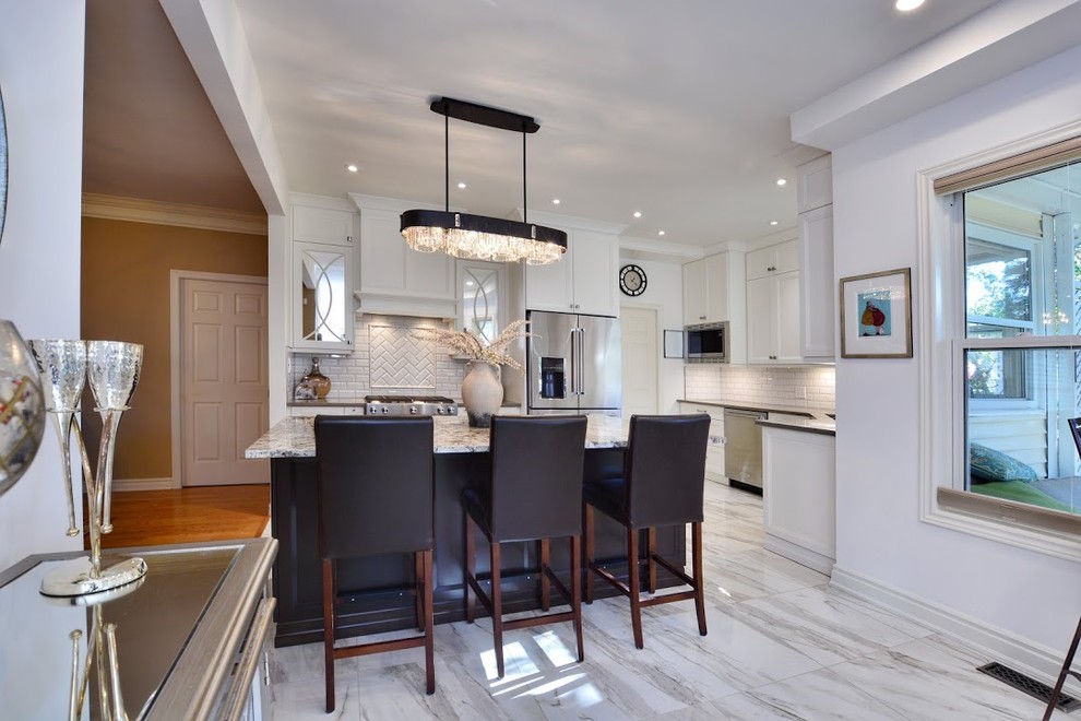Example of a transitional home design design in Toronto