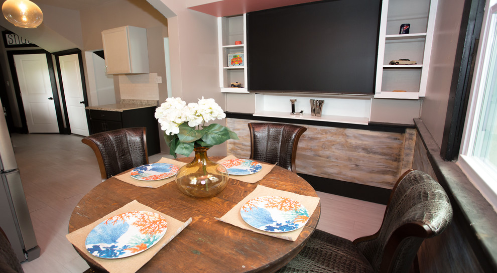 Enclosed kitchen - small transitional l-shaped vinyl floor and white floor enclosed kitchen idea with a double-bowl sink, recessed-panel cabinets, black cabinets, laminate countertops, white backsplash, subway tile backsplash, stainless steel appliances and gray countertops