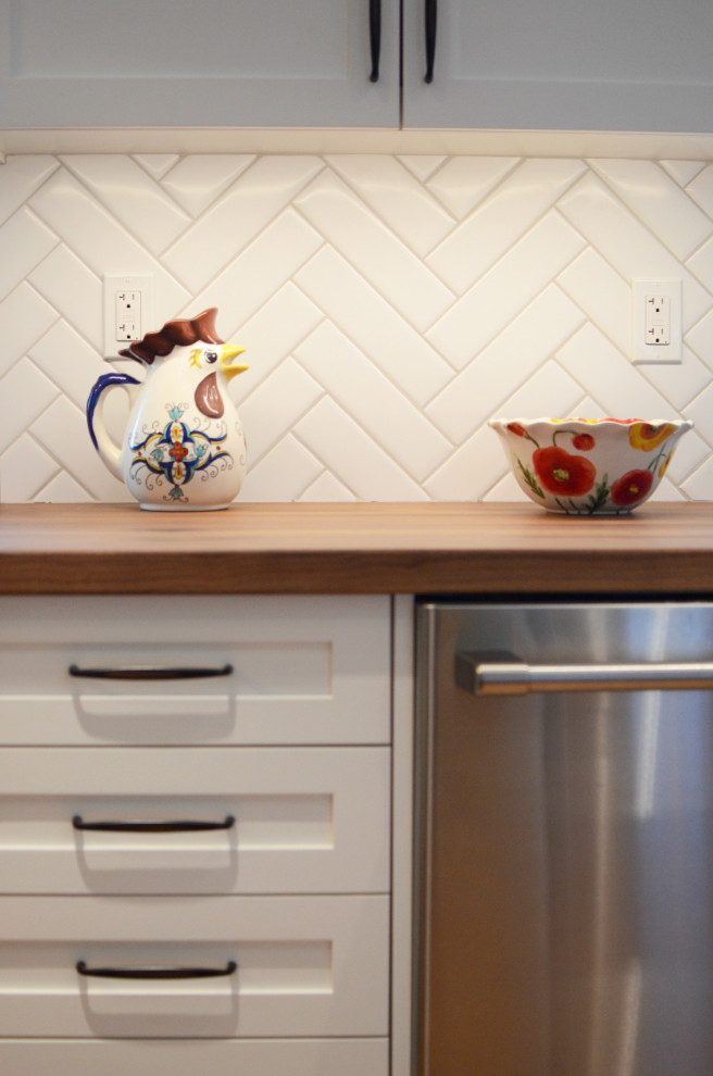 Inspiration for a small transitional light wood floor kitchen remodel in Calgary