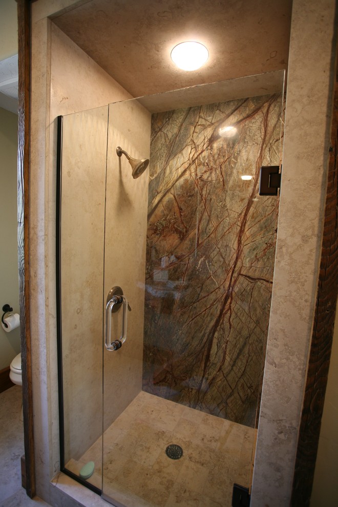Alcove shower - mid-sized rustic 3/4 porcelain tile and beige floor alcove shower idea with furniture-like cabinets, medium tone wood cabinets, a two-piece toilet, yellow walls, an integrated sink, granite countertops and a hinged shower door