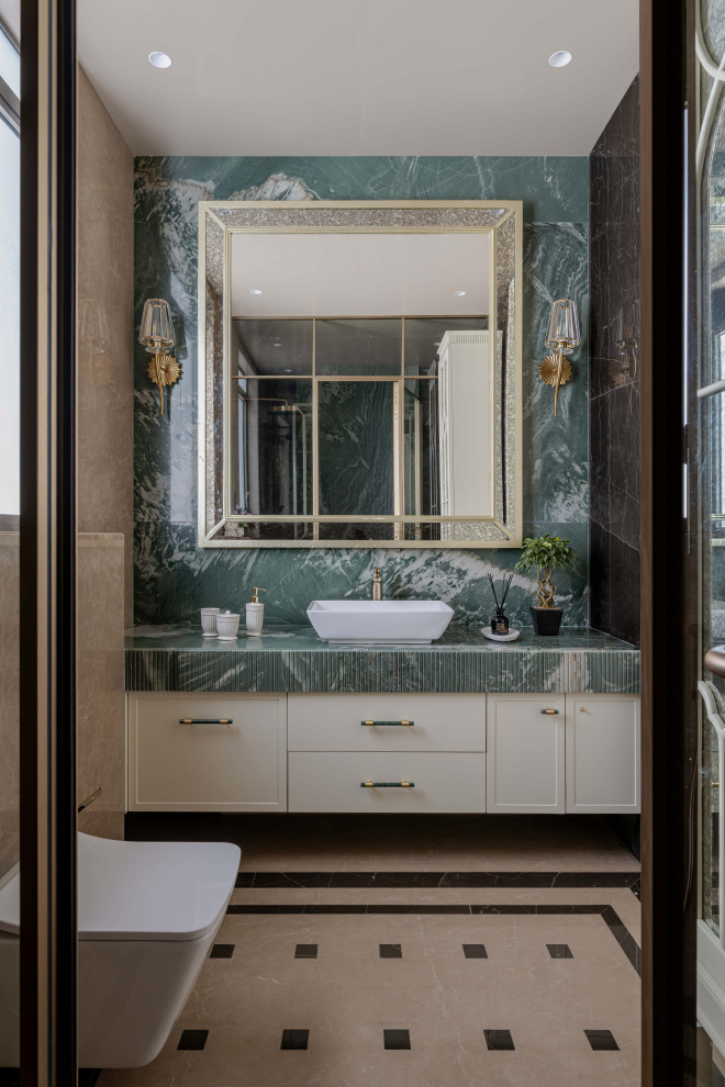 Inspiration for a contemporary bathroom in Mumbai With Shaker Cabinets, Yellow Cabinets, Green Tile and a Vessel Sink.