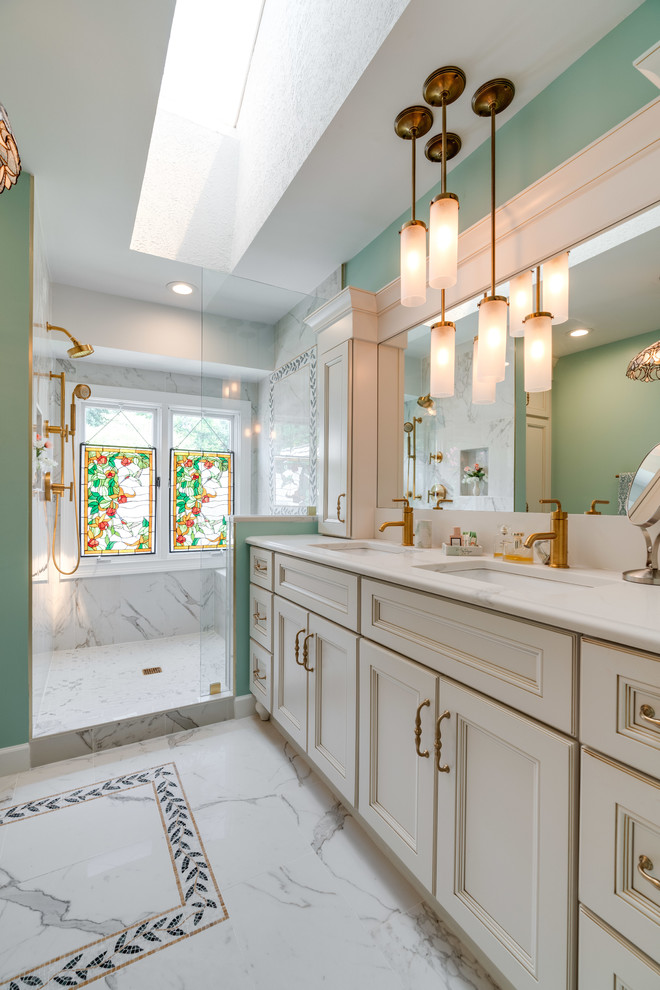 Design ideas for a large traditional master bathroom in DC Metro with recessed-panel cabinets, a corner shower, an undermount sink, engineered quartz benchtops, a hinged shower door, turquoise cabinets, green walls, white floor and white benchtops.