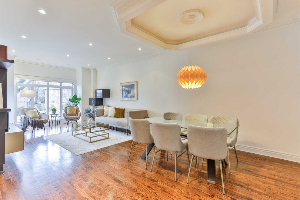 Transitional dining room photo in Toronto