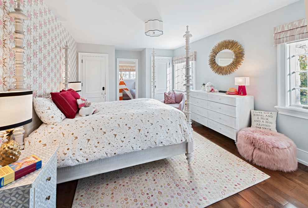 Inspiration for a transitional kids' room for girls in Ottawa with multi-coloured walls and dark hardwood floors.