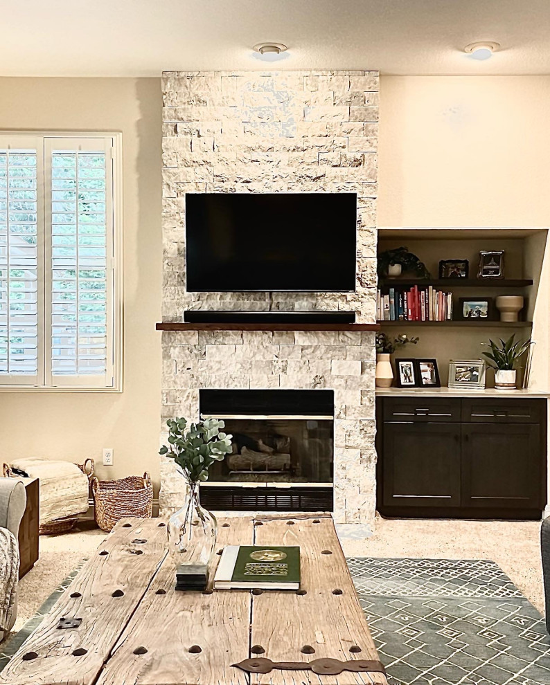 Example of a transitional home design design in Denver