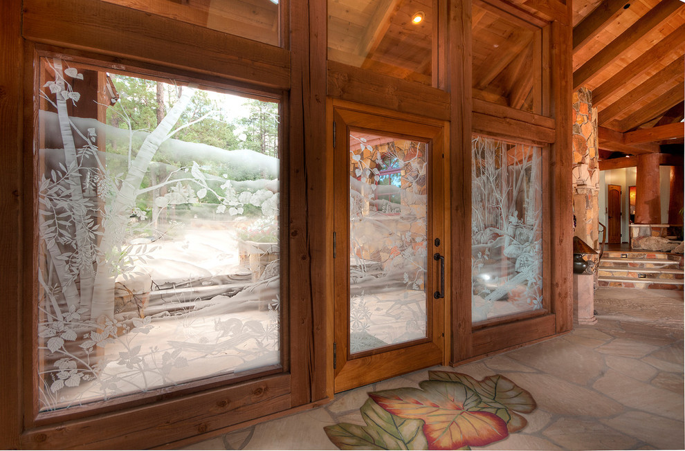 Front door - large transitional front door idea in Phoenix with green walls and a glass front door