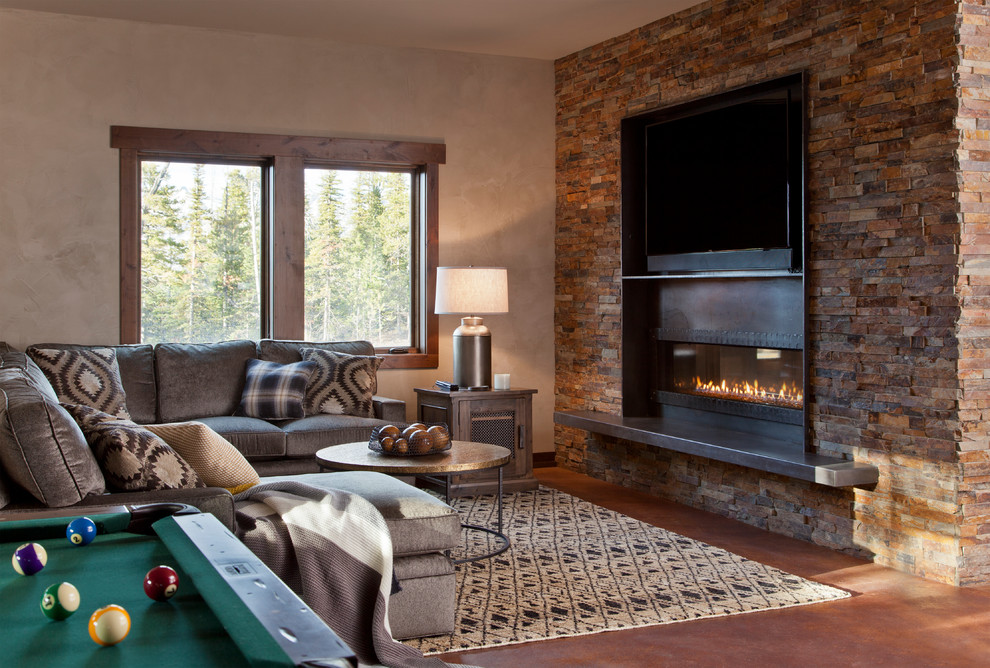 This is an example of a mid-sized country open concept family room in Other with beige walls, a ribbon fireplace, a metal fireplace surround, a wall-mounted tv, laminate floors and beige floor.