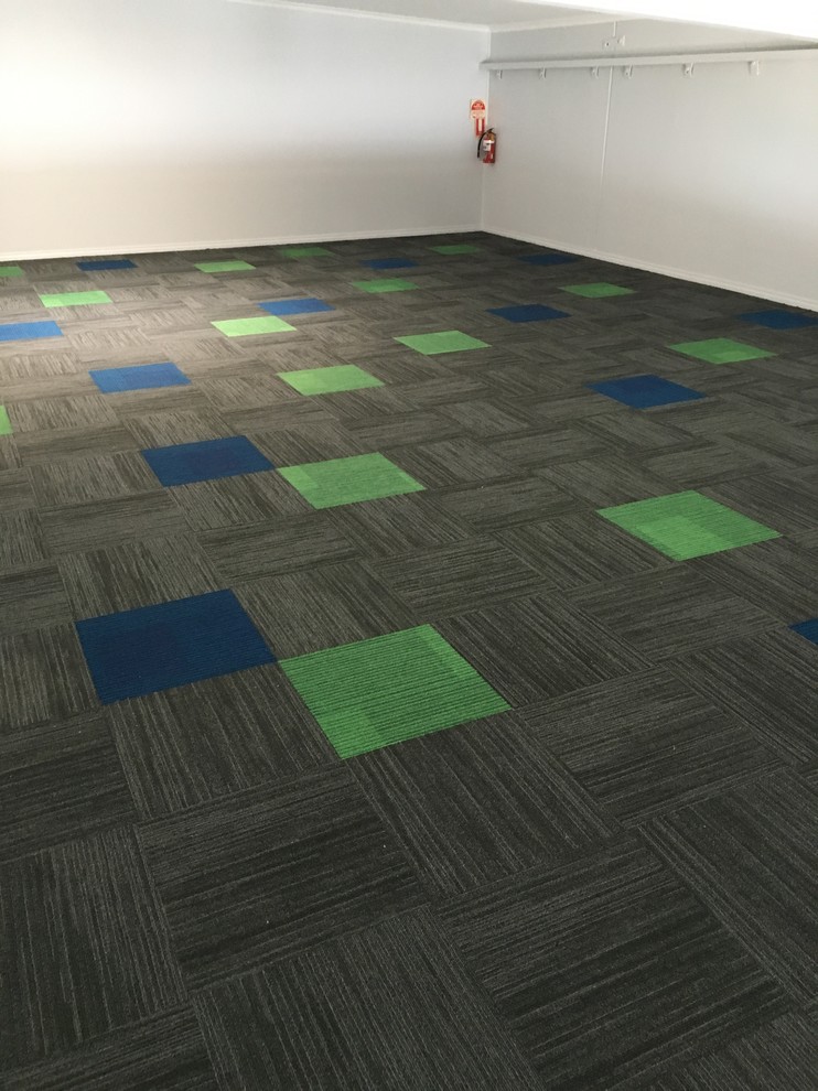 Inspiration for a large contemporary gender-neutral kids' playroom in Melbourne with carpet.