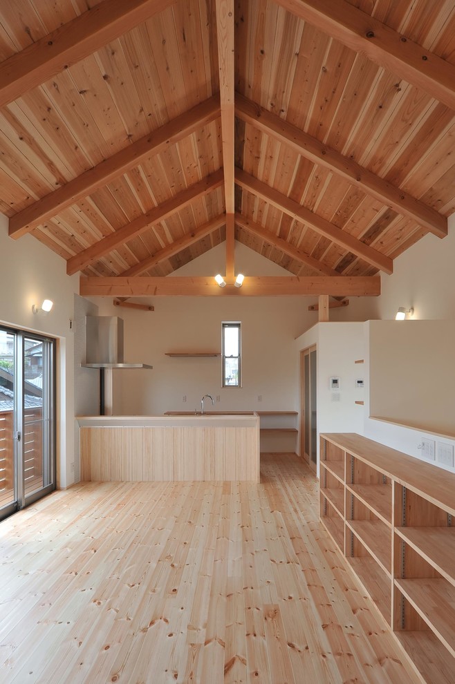 他の地域にあるアジアンスタイルのおしゃれなキッチンの写真