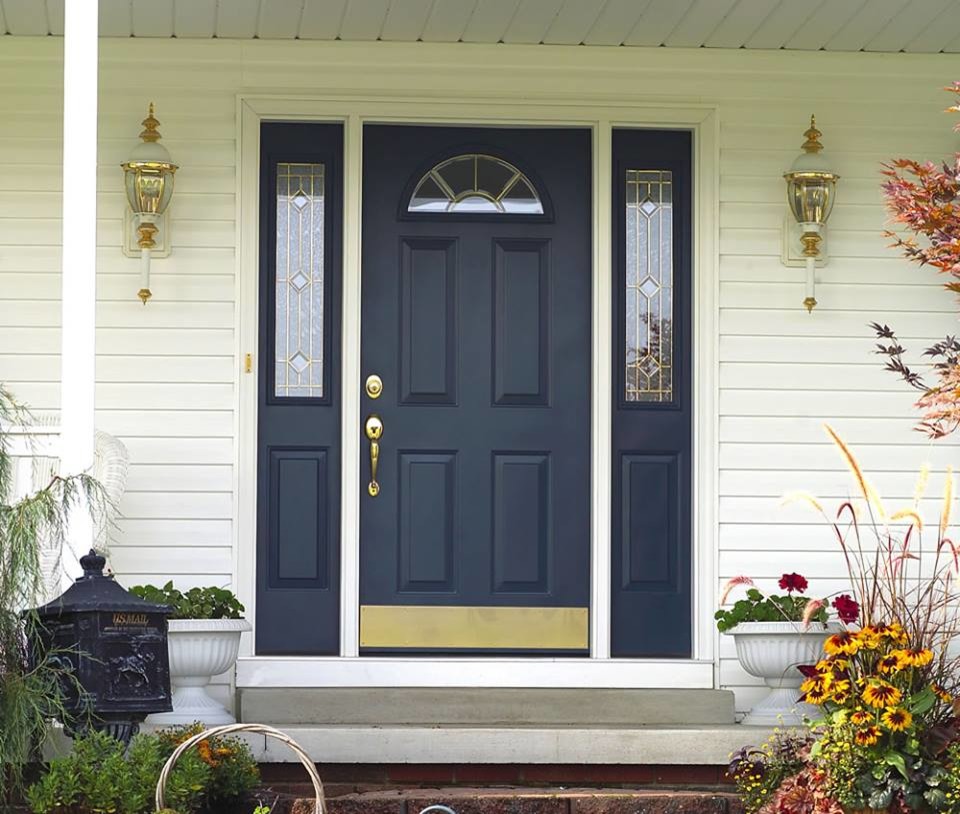 Inspiration for a mid-sized transitional front door remodel with beige walls and a blue front door