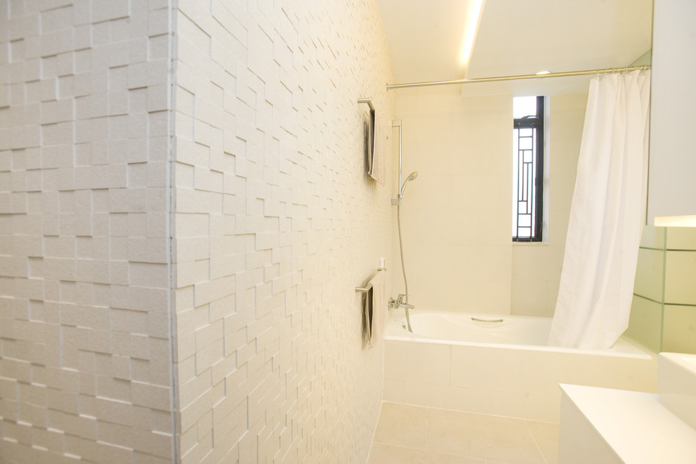 Design ideas for a contemporary bathroom in Hong Kong with an alcove tub, a shower/bathtub combo, white tile and mosaic tile.