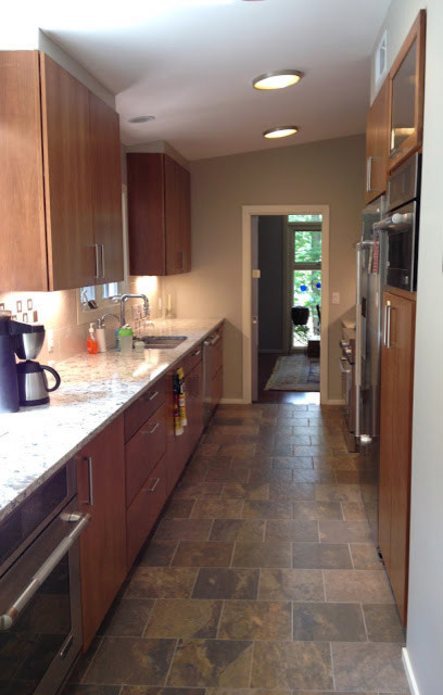 This is an example of a large midcentury kitchen in New York.