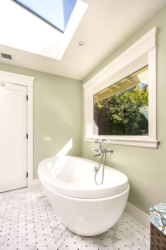 This is an example of an arts and crafts bathroom in San Francisco with a freestanding tub.