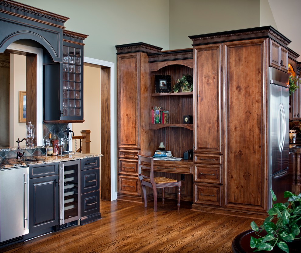 This is an example of a mid-sized country home office in Other.