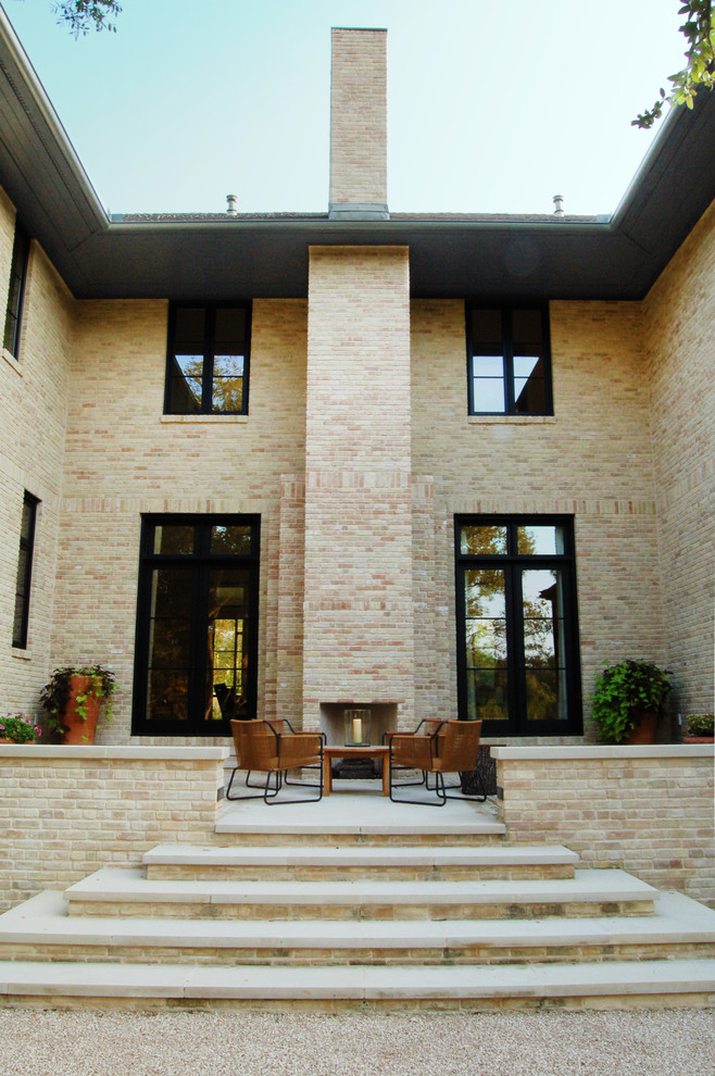 Traditional patio in Austin with a fire feature.