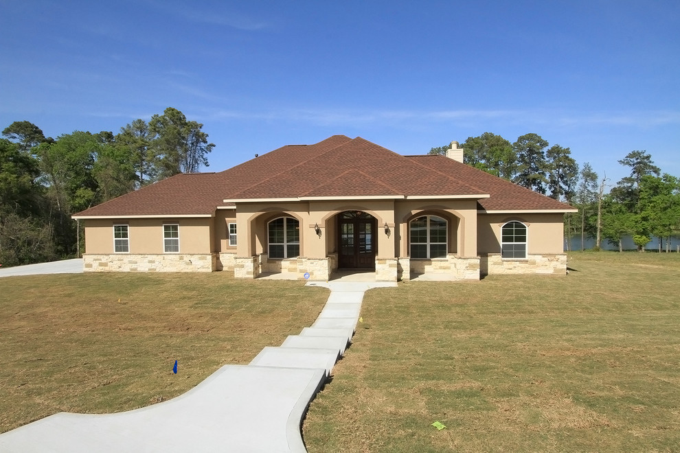 Example of a transitional exterior home design in Houston