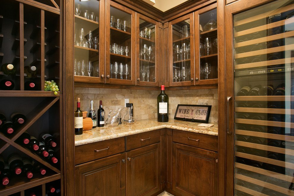 Design ideas for a small traditional wine cellar in San Diego with ceramic floors, diamond bins and beige floor.