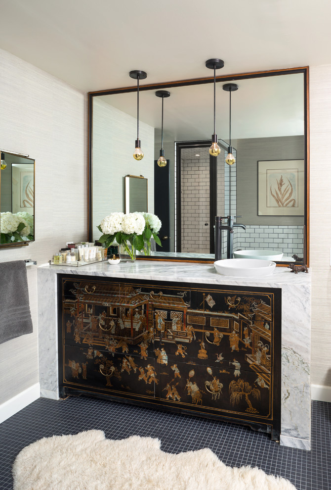 Inspiration for an eclectic 3/4 bathroom in Denver with brown cabinets, a corner shower, white tile, subway tile, beige walls, a vessel sink, a hinged shower door, white benchtops, flat-panel cabinets, marble benchtops, grey floor, a single vanity and a built-in vanity.