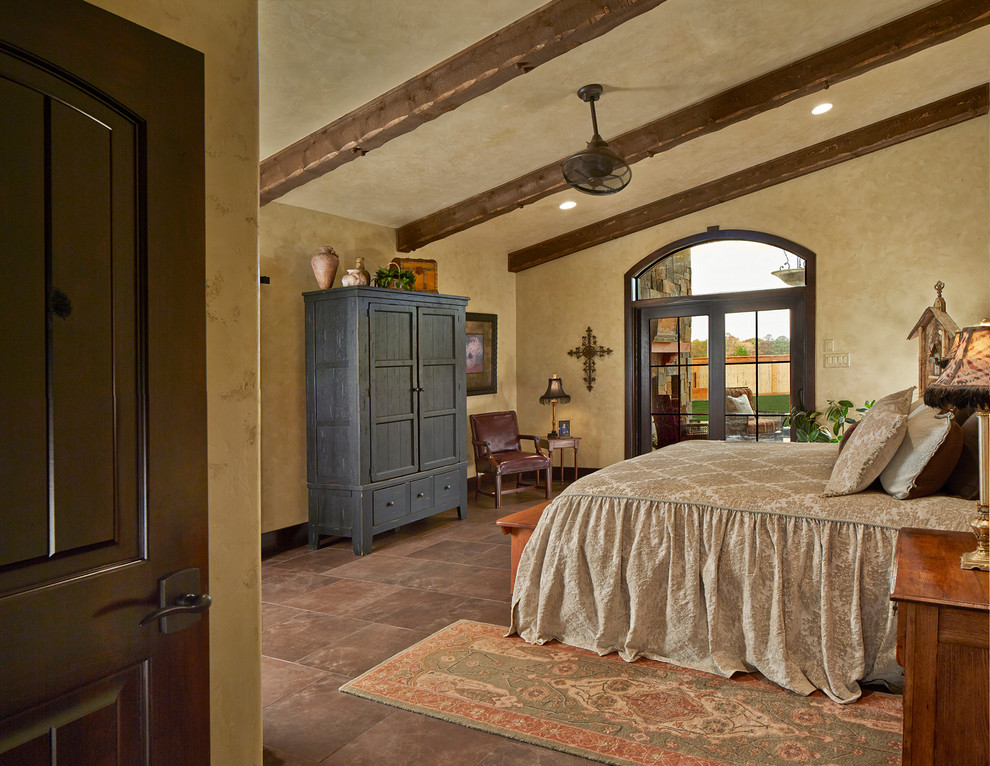 Photo of a traditional bedroom in Dallas with beige walls.