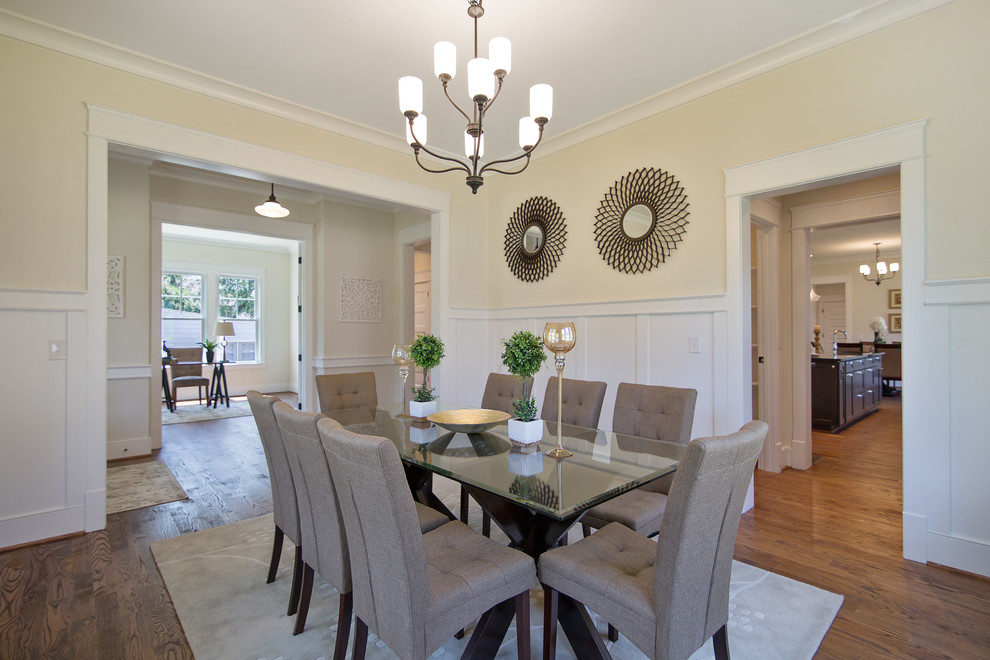 Design ideas for a mid-sized transitional dining room in DC Metro with beige walls and medium hardwood floors.