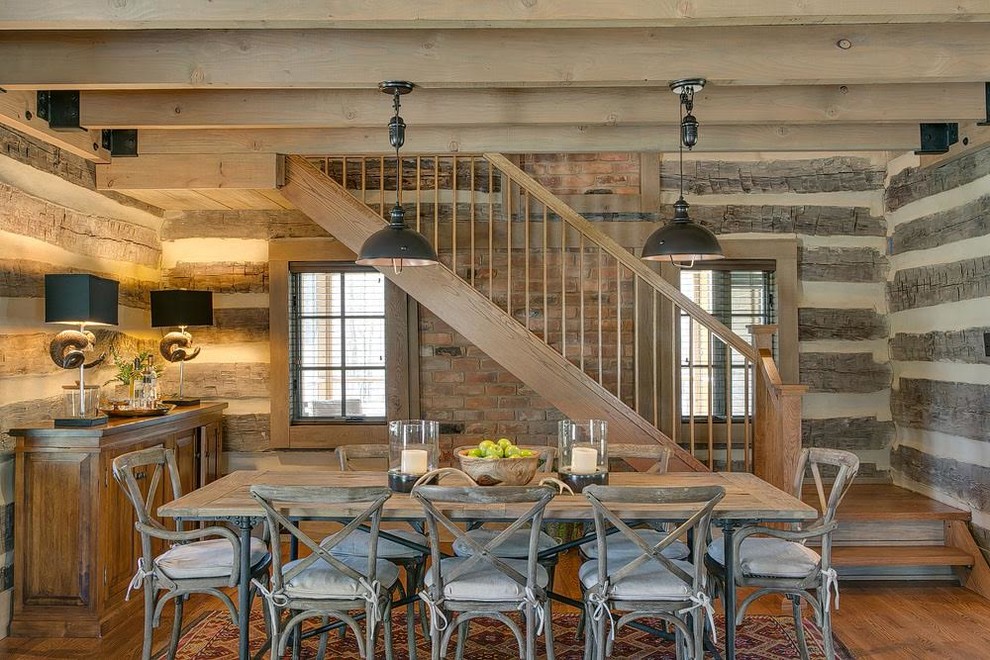 Example of a mountain style medium tone wood floor great room design in Raleigh with brown walls and no fireplace