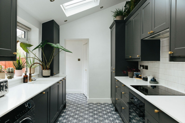 A Victorian home makeover with earthy, mid-century charm midcentury-kitchen