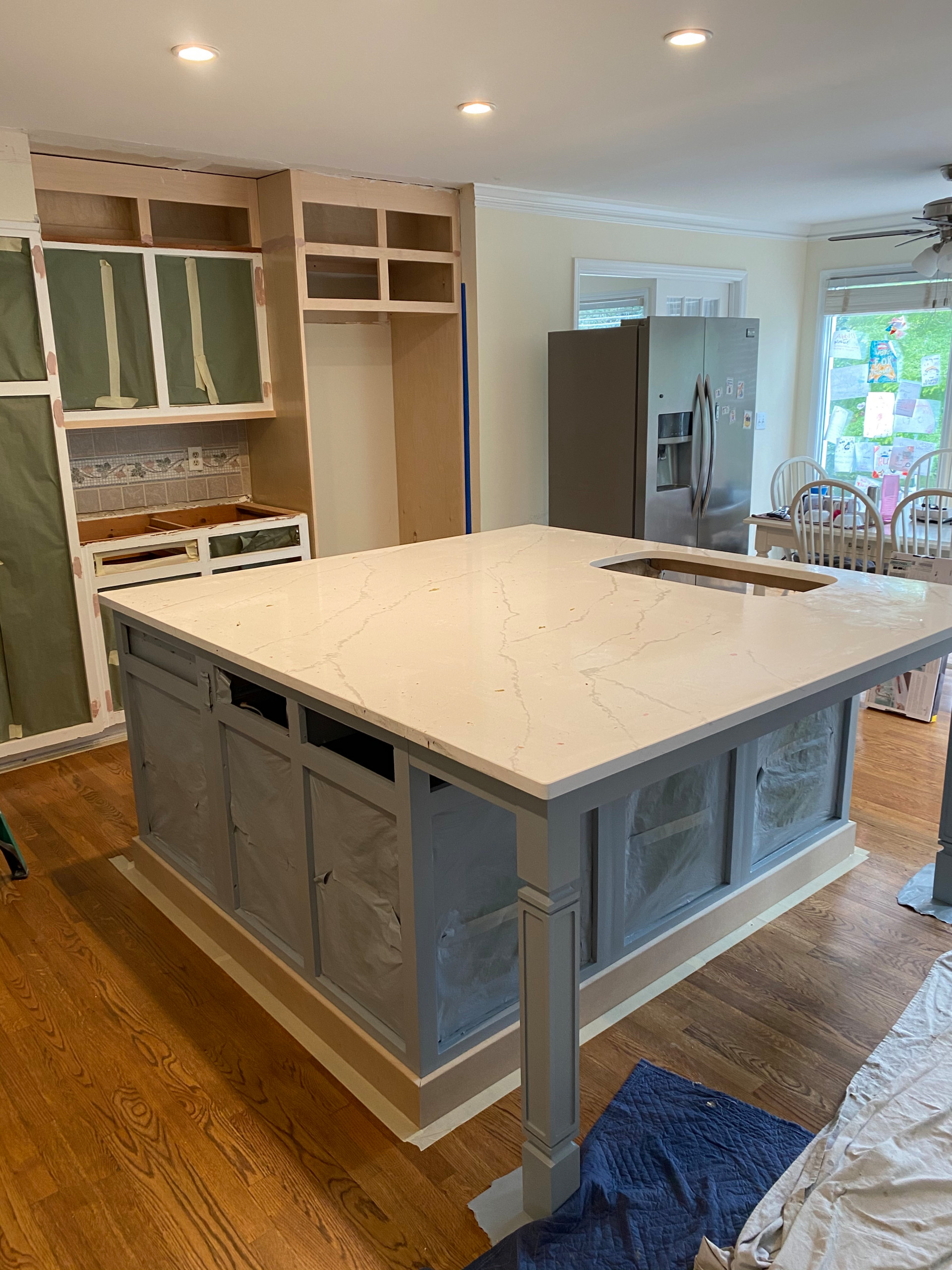 Kitchen face lift. painting cabinets and new island