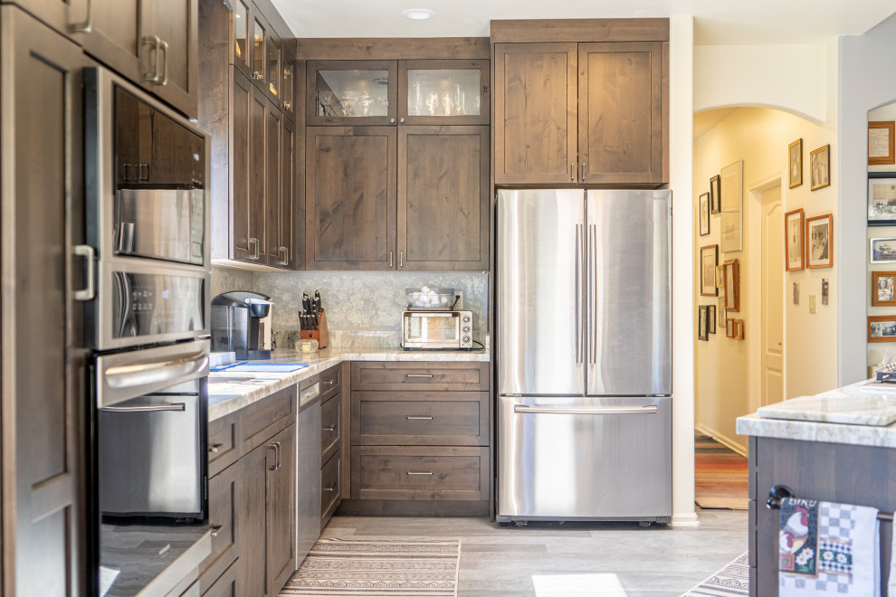 Kitchen - transitional kitchen idea with shaker cabinets, medium tone wood cabinets and an island