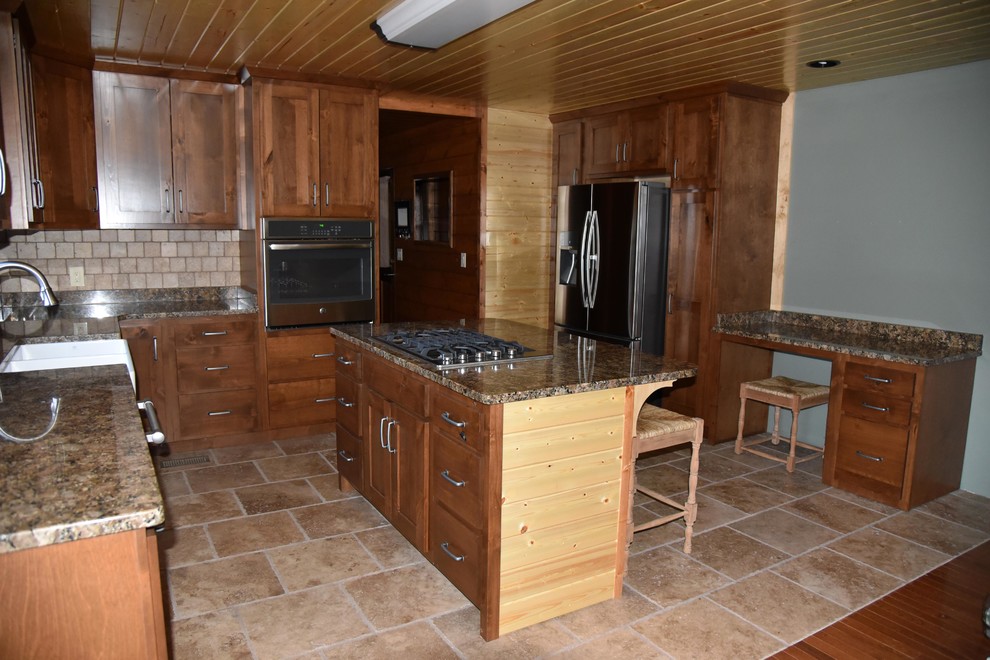 Mountain style eat-in kitchen photo with shaker cabinets and medium tone wood cabinets
