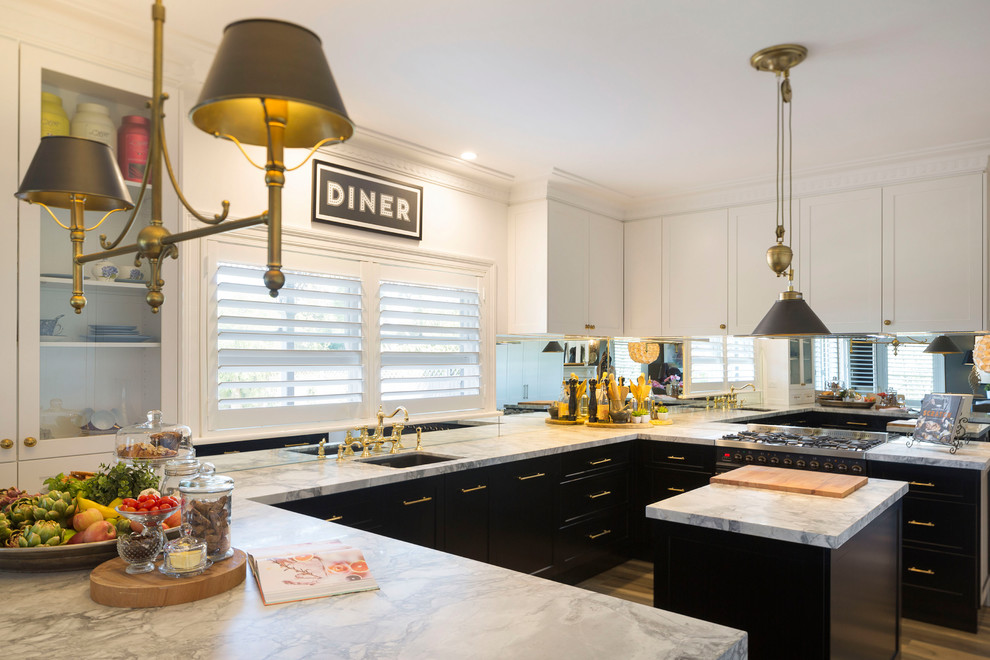 Photo of a mid-sized transitional u-shaped kitchen in Sydney with a single-bowl sink, shaker cabinets, marble benchtops, metallic splashback, mirror splashback and with island.