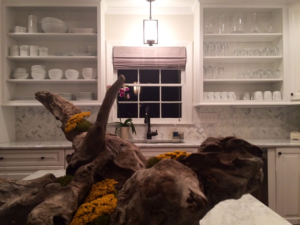Inspiration for a huge transitional u-shaped dark wood floor eat-in kitchen remodel in Charlotte with an undermount sink, raised-panel cabinets, white cabinets, granite countertops, gray backsplash, porcelain backsplash, stainless steel appliances and an island
