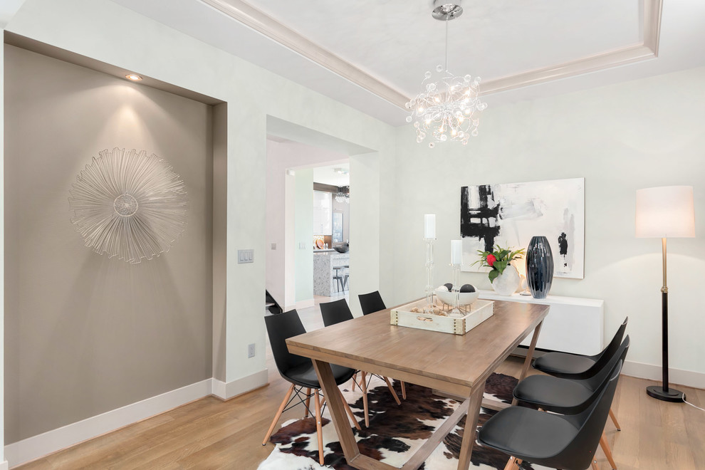 Example of a large minimalist light wood floor great room design in Seattle with green walls