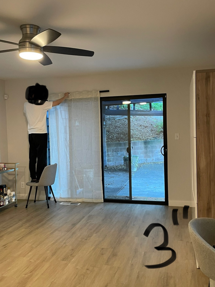 How high above sliding door should the curtain rod be?