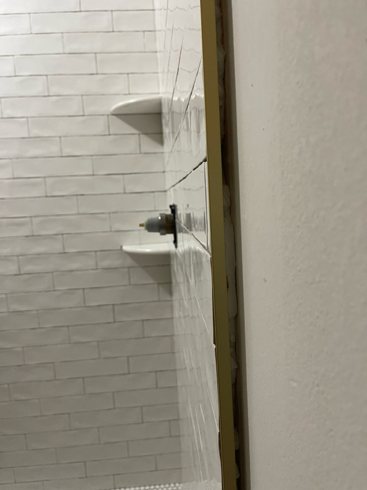 gap between shower tile edge and wall?