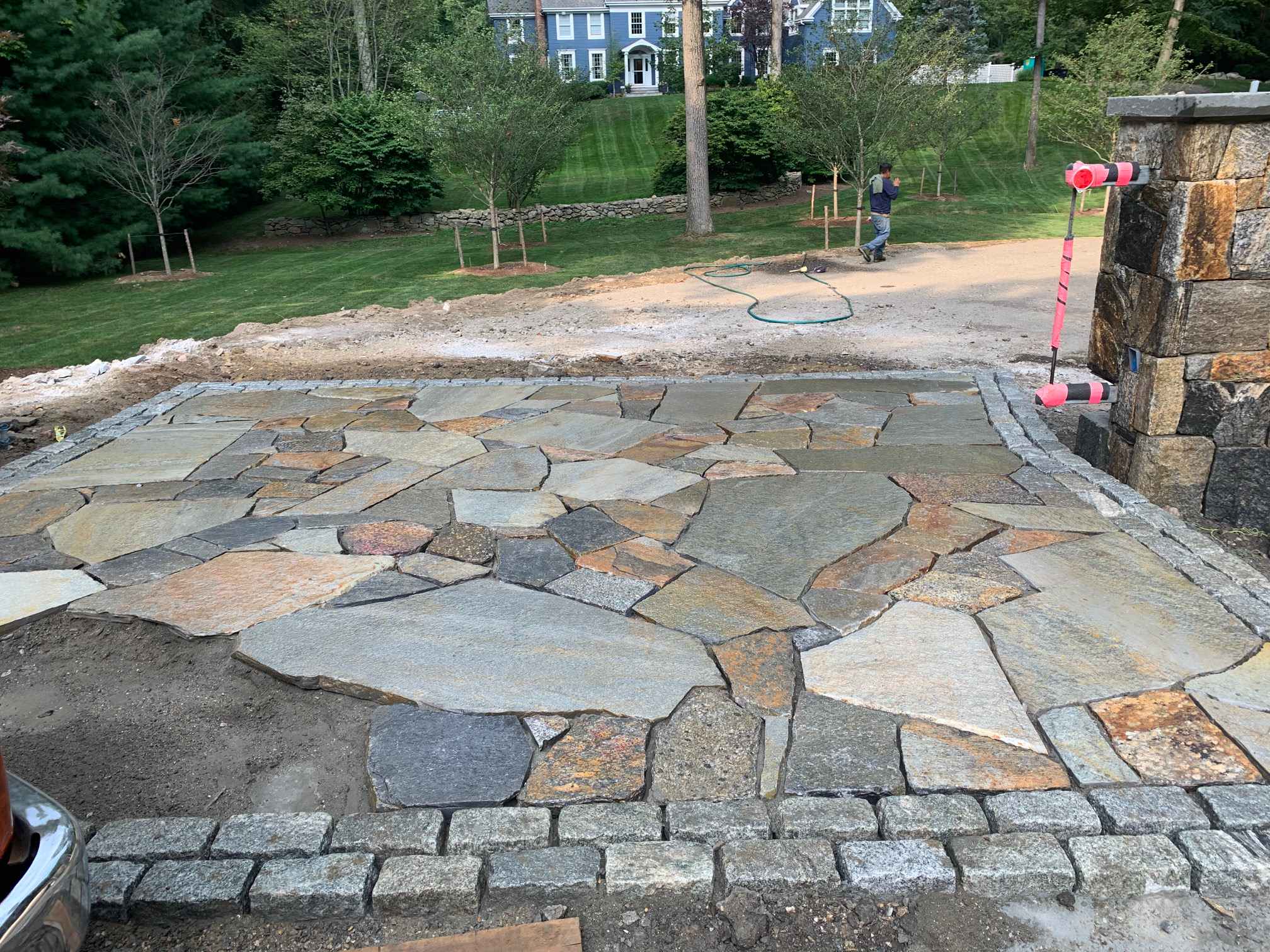 Pound Ridge, NY Driveway Gate using a geometric design for this country estate. Design and Project Management Peter Atkins. Masonry by in house masonry team.  Late Summer 2020