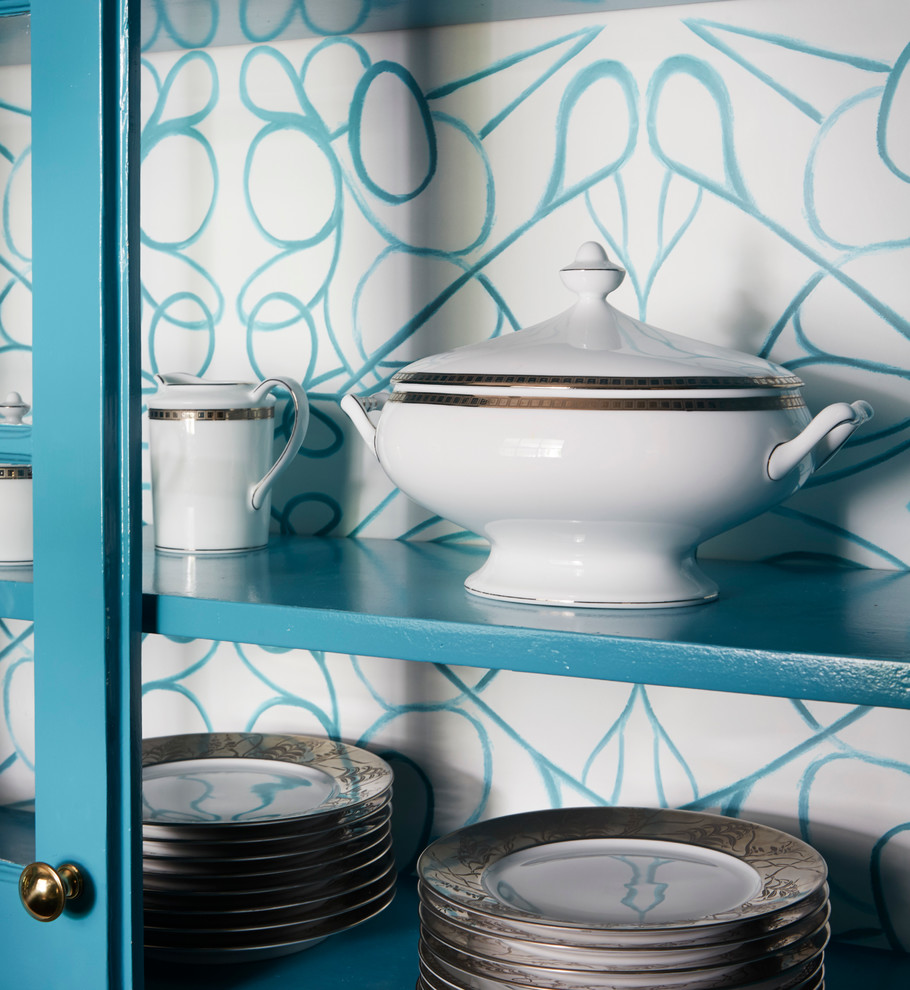 Example of a mid-sized transitional galley dark wood floor kitchen pantry design in Chicago with glass-front cabinets, blue cabinets, quartzite countertops and white backsplash