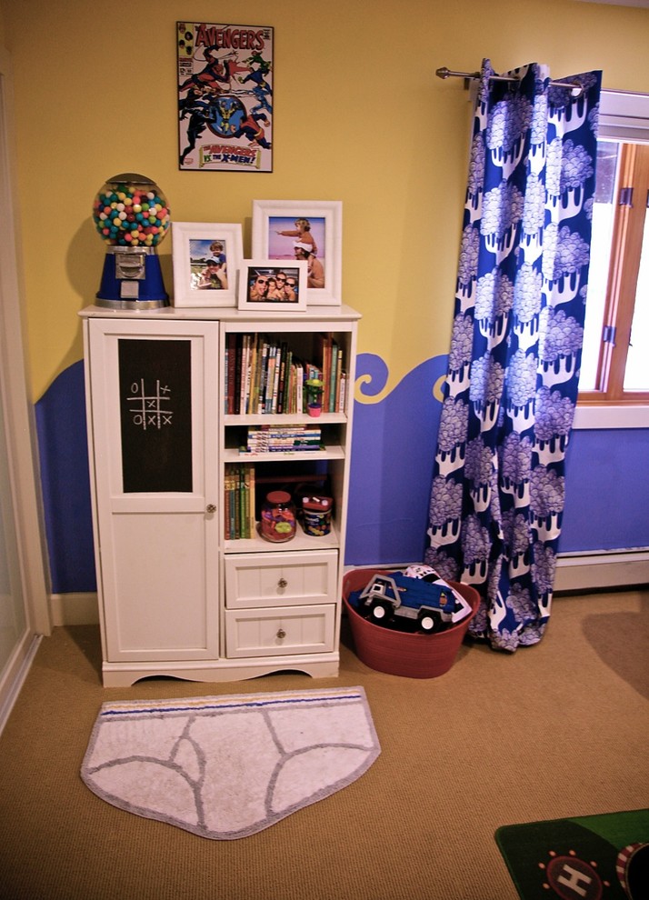 This is an example of a mid-sized traditional kids' bedroom for kids 4-10 years old and boys in Other with carpet and multi-coloured walls.
