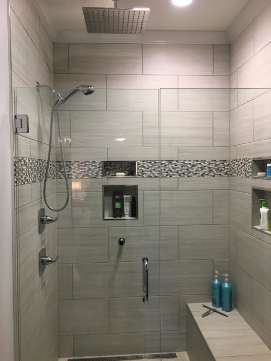 Inspiration for a mid-sized transitional master bathroom in Other with recessed-panel cabinets, dark wood cabinets, an alcove shower, gray tile, beige walls, porcelain floors, an undermount sink, granite benchtops, porcelain tile, beige floor and a hinged shower door.