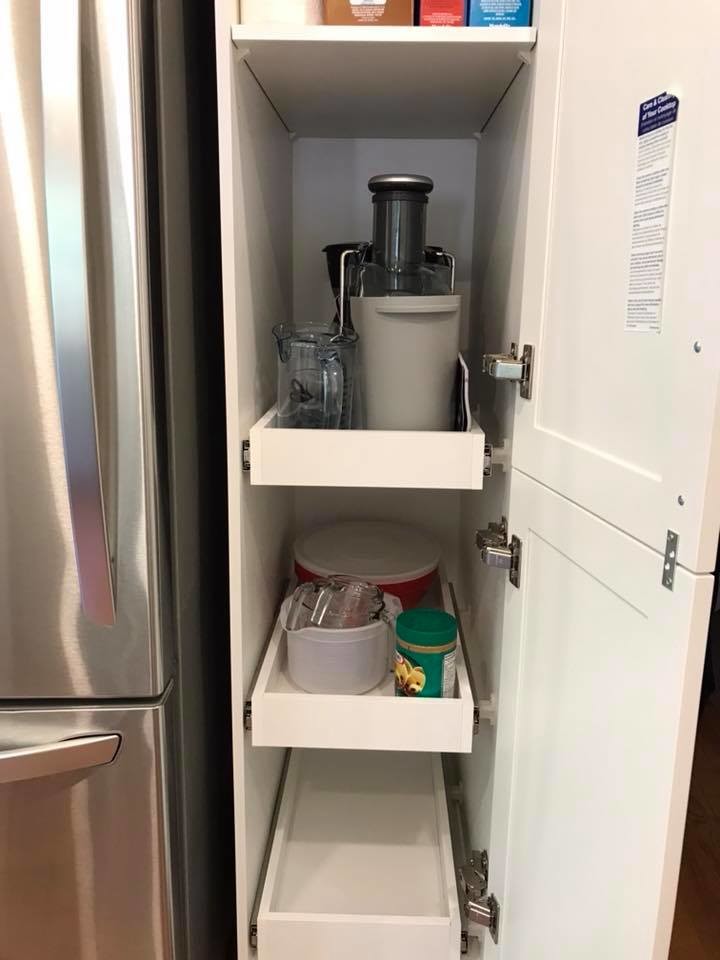 Example of a transitional u-shaped medium tone wood floor eat-in kitchen design in Toronto with an undermount sink, raised-panel cabinets, white cabinets, quartz countertops, white backsplash, porcelain backsplash, stainless steel appliances, no island and white countertops