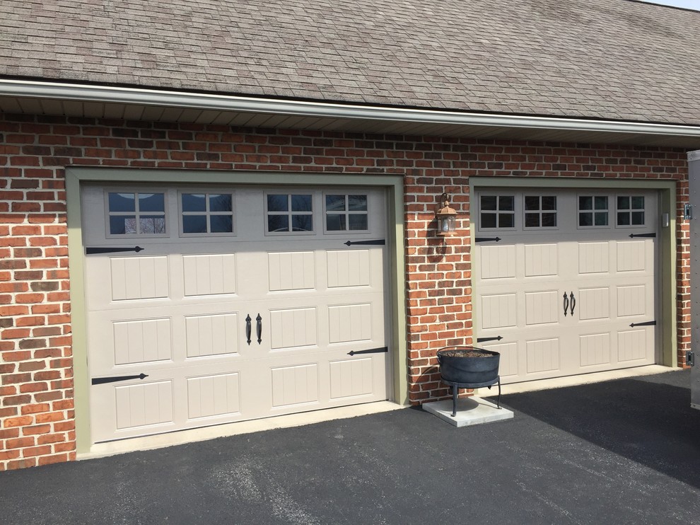 Design ideas for a mid-sized country detached two-car garage in Other.