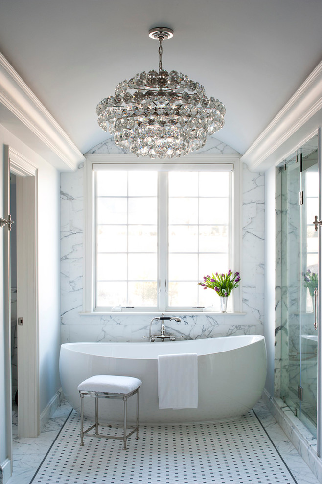 Design ideas for a mid-sized modern master bathroom in Philadelphia with an undermount sink, marble benchtops, a freestanding tub, an open shower, gray tile, stone tile, grey walls and marble floors.