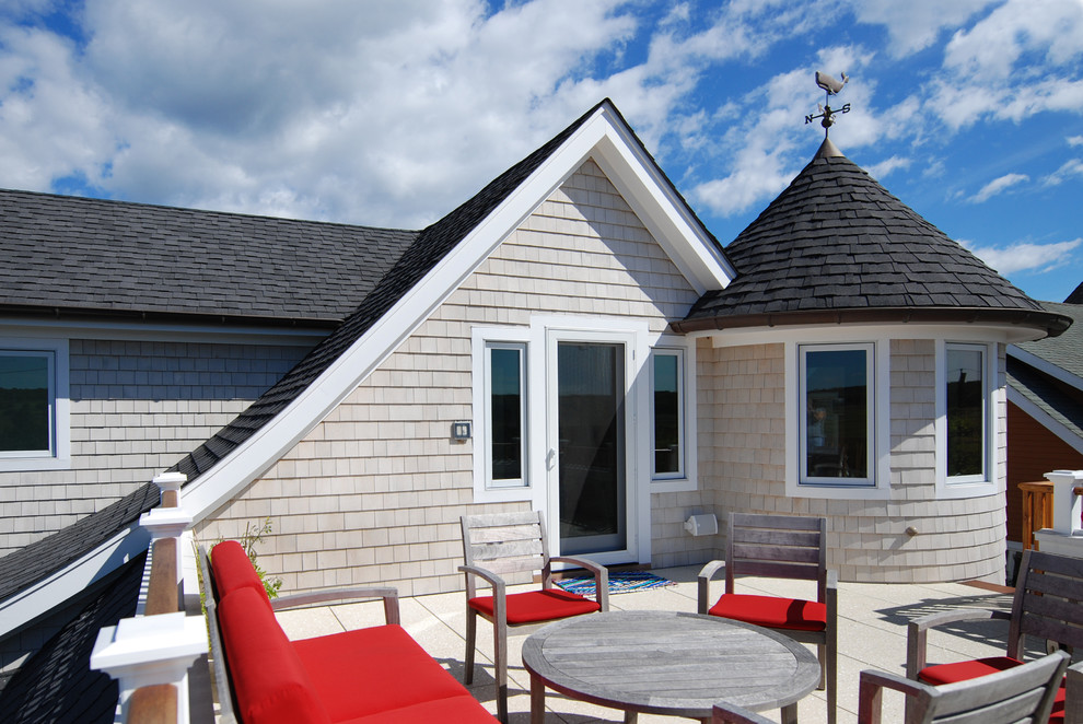 This is an example of a beach style rooftop and rooftop deck in Huntington.