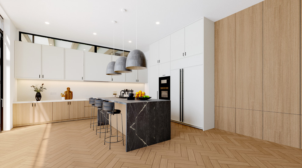Inspiration for a large modern l-shaped open plan kitchen in Los Angeles with an undermount sink, flat-panel cabinets, light wood cabinets, marble benchtops, yellow splashback, engineered quartz splashback, panelled appliances, light hardwood floors, with island and black benchtop.