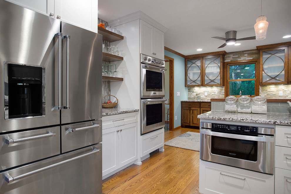 Example of a huge transitional kitchen design in Minneapolis