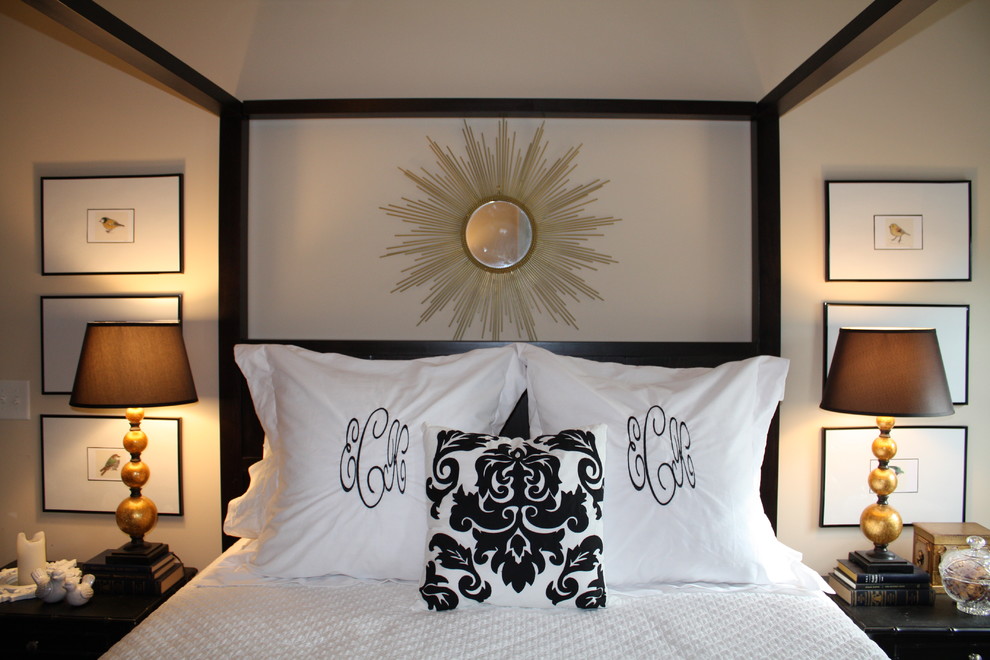 Trendy master bedroom photo in Charlotte with white walls